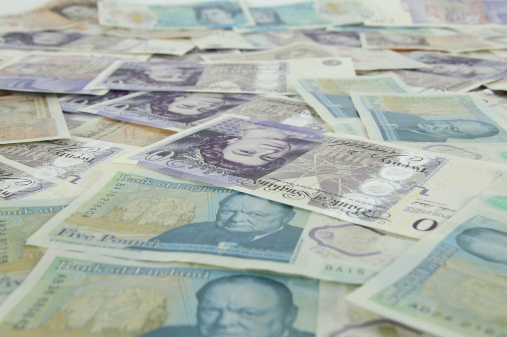 A photo of English bank notes spread out
